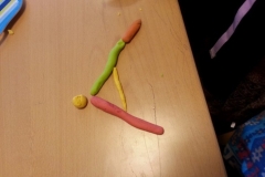 Arabic letter made with colourful clay