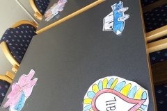 Colourful craft work on the activity table